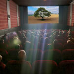 documentaire "Paysans du Ciel à la Terre" dans une salle de cinéma.